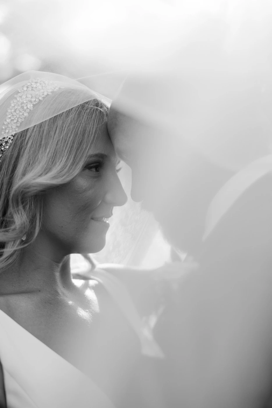 Veiled bride in profile, black and white
